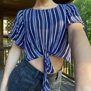 Striped boutique brand top with a tie front and flowy sleeves. Size S.